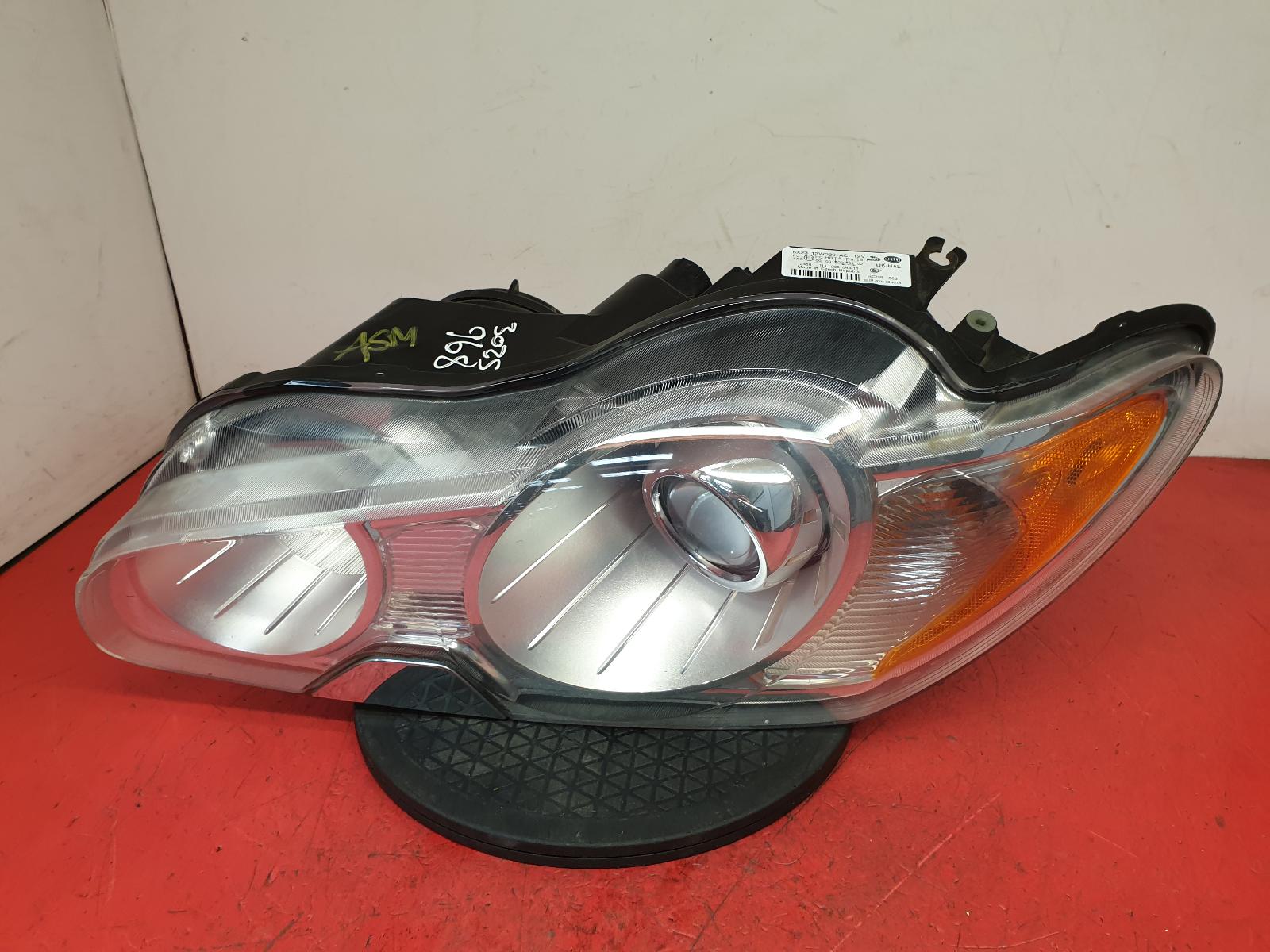 L Headlamp Xf Jaguar 2008 