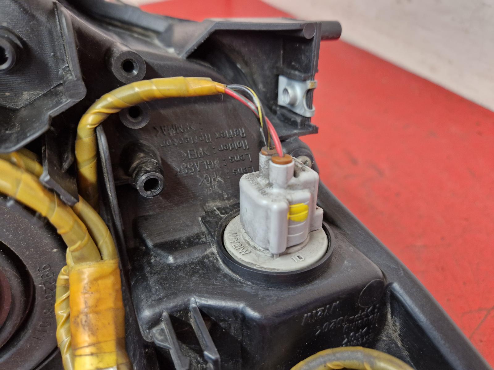 L Headlamp 3 Mazda 2010 