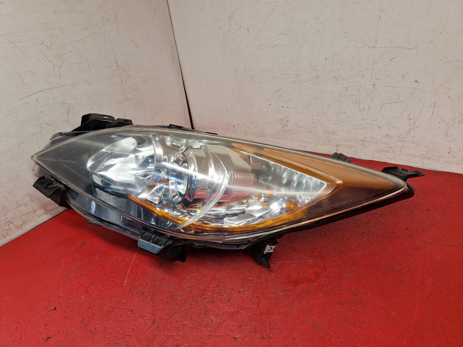 L Headlamp 3 Mazda 2010