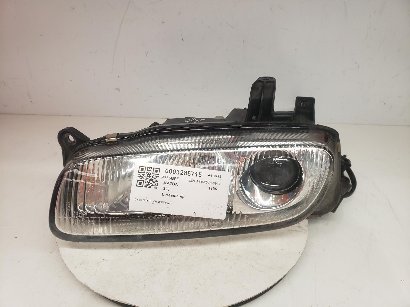 View Auto part L Headlamp Mazda 323 1996