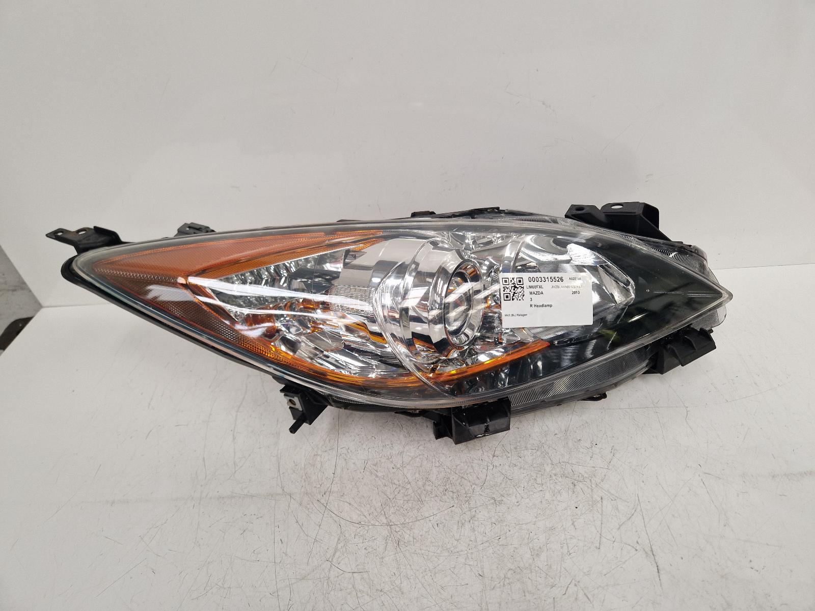 View Auto part R Headlamp Mazda 3  2010